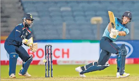  ??  ?? England’s Ben Stokes (right) hit 10 sixes and four boundaries to score 99 off just 52 balls in the second ODI against India in Pune on Friday.