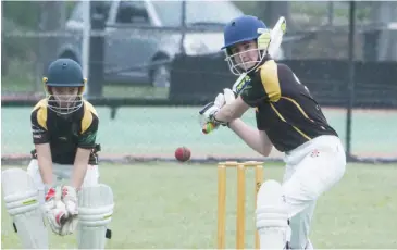  ??  ?? Warragul’s Dean Swinburne lines up an attacking drive through cover during the under 16 T20 match against Jindivick.For junior cricket reports, read The Trader.