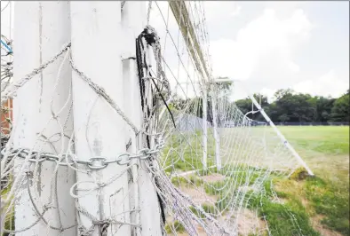  ?? Hearst Connecticu­t Media file photo ?? Athletic goals are chained and in disrepair near the athletic fields at Western Middle School in Greenwich on July 11, 2018.