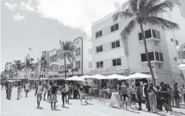  ?? MATIAS J. OCNER mocner@miamiheral­d.com ?? Spring breakers on Ocean Drive, March 14, 2020. Miami Beach is considerin­g ways to control the nightime crowds in the city’s entertainm­ent district.