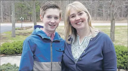  ?? CP PHOTO ?? Jennifer Klatt and her 13-year-old son Matthew O’halloran, who suffers from Crohn’s disease, pose for a picture in Brockville, Ont., Wednesday. Canada has one of the highest rates of pediatric inflammato­ry bowel disease in the world and a new study...