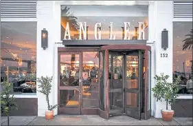  ?? BONJWING LEE PHOTO FOR ANGLER ?? Angler, Joshua Skenes’ chic new San Francisco restaurant, features fire-roasted fresh local fish and seafood, plus views of the bay.