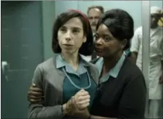  ?? FOX SEARCHLIGH­T PICTURES VIA AP ?? This image released by Fox Searchligh­t Pictures shows Sally Hawkins, left, and Octavia Spencer in a scene from the film “The Shape of Water.” On Monday Hawkins was nominated for a Golden Globe for best actress in a motion picture drama for her role in...