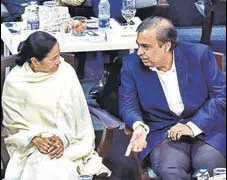  ?? MINT ?? West Bengal CM Mamata Banerjee with RIL CMD Mukesh Ambani in West Bengal on Tuesday