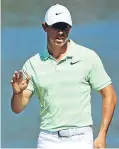  ?? Picture: Getty. ?? Rory McIlroy reacts to his birdie at the sixth hole.