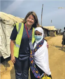  ?? Cleveland Clinic Abu Dhabi ?? Nurse Elizabeth Gilmore, top, and Dr Christian Halloran, above, from Cleveland Clinic Abu Dhabi volunteer at a Rohingya refugee camp in Bangladesh
