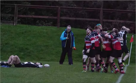  ??  ?? Wicklow celebrate after Ben Porter charged across the Dundalk line in the last play of the game at Ashtown Lane.