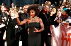  ??  ?? Actors Viola Davis and Liam Neeson (below) arrive for the world premiere of ‘Widows'.