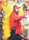  ?? (Reuters) ?? KANSAS CITY CHIEFS head coach Andy Reid is doused with Gatorade by his players at the end of their 31-20 victory over the San Francisco 49ers in Super Bowl LIV on Sunday night.