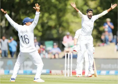  ?? Reuters ?? ↑
India’s Jasprit Bumrah celebrates after taking the wicket of New Zealand’s BJ Watling during day two of the second Test in Christchur­ch on Sunday.