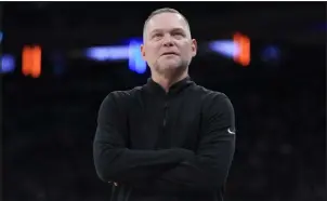  ?? MARY ALTAFFER — THE ASSOCIATED PRESS ?? Nuggets coach Michael Malone patrols the sideline during the second half of a game against the New York Knicks on Saturday at Madison Square Garden in New York.