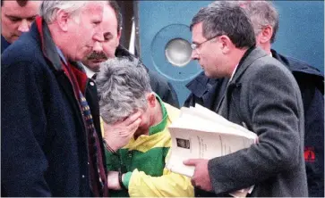  ??  ?? John Gilligan arriving in Baldonnel aerodrome with members of the Lucan team after his extraditio­n from the UK