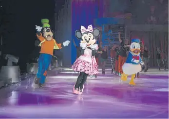  ?? ?? Goofy, Minnie Mouse and Donald Duck.