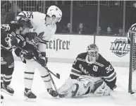  ?? MARY ALTAFFER / THE ASSOCIATED PRESS FILES ?? Maple Leafs winger James van Riemsdyk scores on New York Rangers goaltender Henrik Lundqvist during a game last month at Madison Square Garden.