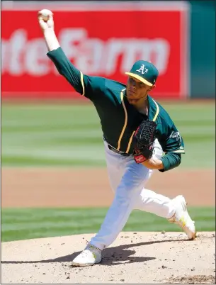  ?? JANE TYSKA/TRIBUNE NEWS SERVICE ?? Oakland Athletics starting pitcher Sonny Gray throws against the Tampa Bay Rays during the first inning at the Coliseum in Oakland on Wednesday. The A's won, 7-2.