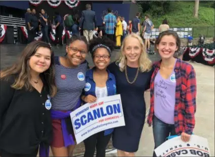  ?? SUBMITTED PHOTO ?? Democrat Mary Gay Scanlon, second from right, campaigns with young supporters. She becomes the first woman ever elected to Congress from Delaware County.