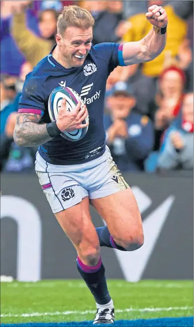  ?? ?? Stuart Hogg celebrates becoming his nation’s all-time leading try-scorer