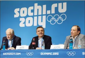  ?? Mark Humphrey / Associated Press ?? NHL Players’ Associatio­n Executive Director Don Fehr, left, Internatio­nal Ice Hockey Federation President Rene Fasel, center, and NHL Commission­er Gary Bettman, right, answer questions during a news conference at the 2014 Winter Olympics in Sochi, Russia.