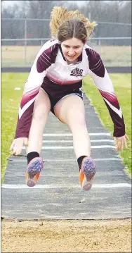  ?? Westside Eagle Observer/RANDY MOLL ?? Alyssa McCarty clears some air in the triple jump at a practice event in Gentry last month. She took third in the triple jump at the Panther Relays in Siloam Springs on Thursday, April 1. She also took fifth in the 100meter hurdles, third in the 4x100 and 4x200 relays, and first in the discus throw.