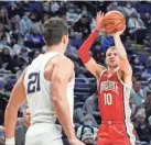  ?? MATTHEW O’HAREN/USA TODAY SPORTS ?? Justin Ahrens hit a big 3-pointer that helped prevent a Penn State comeback on Sunday.