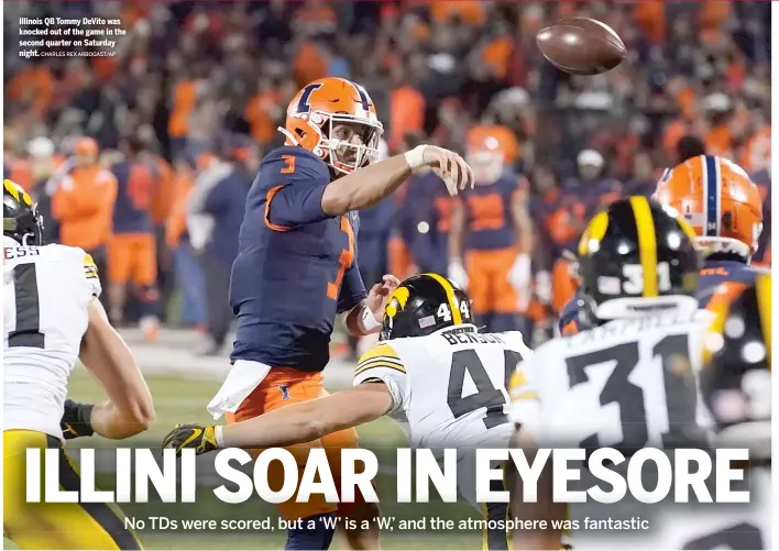  ?? CHARLES REX ARBOGAST/AP ?? Illinois QB Tommy DeVito was knocked out of the game in the second quarter on Saturday night.