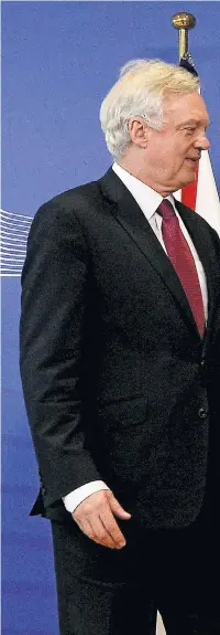  ??  ?? David Davis, right, and his opposite number in the Brexit negotiatio­ns, Michel Barnier, shake hands at the opening of the talks in Brussels yesterday