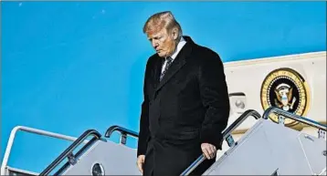  ?? CAROLYN KASTER/AP ?? President Donald Trump, seen arriving Sunday at Andrews Air Force Base, Md., had already lost his lead lawyer last week.