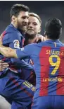 ??  ?? Barcelona’s Ivan Rakitic (centre) celebrates with Lionel Messi (left) and Luis Suarez after scoring during a Spanish La Liga football match between Real Madrid and Barcelona, dubbed ‘El Clasico’, at the Santiago Bernabeu stadium in Madrid, Spain, last...