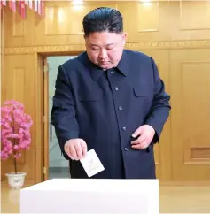  ??  ?? Kim casts his vote in the election for the Supreme People’s Assembly in North Korea. — Reuters photo