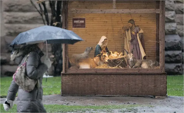  ?? PETER J. THOMPSON/ POSTMEDIA NEWS FILES ?? A nativity scene outside Toronto’s Old City Hall. Since Christmas comes in many manifestat­ions, perhaps it’s little wonder Canadians also seem in a hopeless muddle about its public expression­s.