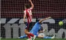  ?? Photograph: Gabriel Bouys/AFP/Getty Images ?? Marcos Llorente equalises for Atlético at the end of the first half.