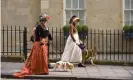  ??  ?? women in Regency costume walking dogs through Bath during the city’s annual Jane Austen festival. Photograph: Alamy