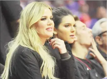  ??  ?? Television personalit­ies Khloe Kardashian and Kendall Jenner in attendance as the Houston Rockets play against the Los Angeles Clippers in Los Angeles, California, U.S., May 8, 2015. (Gary A. Vasquez-USA TODAY Sports /File Photo)