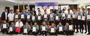  ??  ?? Panasonic continues to invest in human resources. Panasonic Corporatio­n (Japan) general manager for CSR & Citizenshi­p Dept. Rika Fukuda (3rd from left, back row), Don Bosco Technical Institute - Makati rector Fr. Alexander Garces (2nd from left, back...