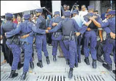  ?? REUTERS ?? Maldivian police push back opposition supporters demanding the release of jailed lawmakers, in Male on February 9.