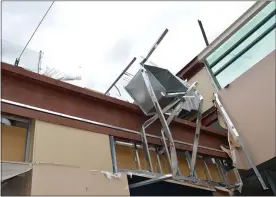  ?? BY RACHEL RAVINA — MEDIANEWS GROUP ?? Wreckage from the inside of the Upper Dublin Township building is still visible Friday afternoon after part of the roof was ripped off from a tornado on Wednesday.