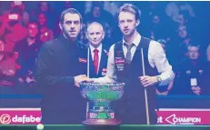  ??  ?? Arch rivals Ronnie O’Sullivan and Judd Trump.