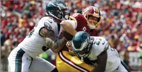  ?? THE ASSOCIATED PRESS — ALEX BRANDON ?? Eagles defensive end Chris Long, left, and safety Malcolm Jenkins led the effort to subdue Kirk Cousins and Washington last week. Given the familiarit­y of Kansas City skipper Andy Reid with protege and Eagles coach Doug Pederson, the Birds defense...