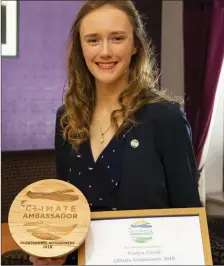  ??  ?? Nadya Doyle from Carrigaddi­n, Newbawn, a 5th year pupil in New Ross CBS, with her Climate Ambassador award.