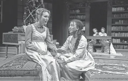  ??  ?? Rebecca Hurd (left) speaks with Netta Walker in “Miss Bennet: Christmas at Pemberley.”