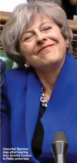  ??  ?? Cheerful: Theresa May after tearing into Jeremy Corbyn in PMQs yesterday