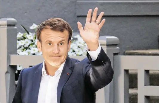 ?? BILD: SN/AFP ?? Präsident Macron versprach „neue Gesichter, neue Talente“. Doch sein neues Team ist großteils das alte.