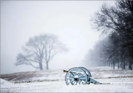  ?? ASSOCIATED PRESS ?? Snow covers an artillery piece at Valley Forge National Historical Park in Valley Forge, where the Continenta­l Army camped during the winter of 1777-1778.