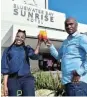  ?? Picture: EUGENE COETZEE ?? THREE CHEERS: Coega Developmen­t Corporatio­n’s Andile April with Bluewater Bay Sunrise Hotel guest relations team leader Akhona Halana