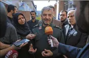  ?? VAHID SALEMI / AP ?? Iran Gen. Mohammad Ali Jafari, the head of the paramilita­ry Revolution­ary Guard, speaks with journalist­s Tuesday in Tehran. He said that the capability of Iran’s ballistic missiles is “enough for now.”