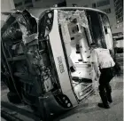  ?? Photo: Felix Wong ?? A police officer at the site of a fatal bus crash in Tai Wai last November.