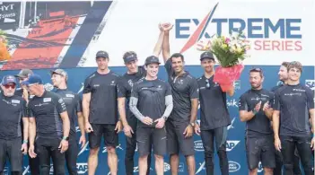  ??  ?? Team Oman Air crew celebrate on the podium of the Extreme Sailing Series 2017 Act 4 in Barcelona, Spain.
