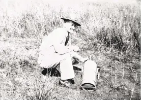  ?? CONTRIBUTE­D BY RICK SZCZEPANSK­I ?? Army Air Corps veteran Joe Szczepansk­i is pictured with a canister of mustard gas, when he served as a chemical warfare systems battalion on Oahu, Hawaii, in 1938.