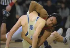  ?? AUSTIN HERTZOG - MEDIANEWS GROUP ?? Owen J. Roberts’ Josh Jackson, facing, drives through on a headlock of Spring-Ford’s Aidan Phelan at 120 pounds Wednesday.