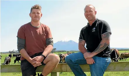  ??  ?? Pihama dairy farmer Paddy Stevenson (left) and Grant Gibson, ADM Taranaki area manager.